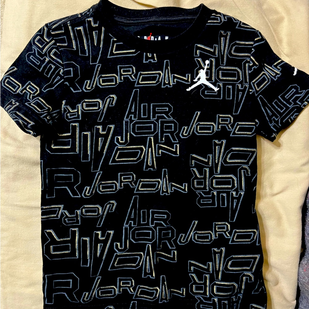 Air Jordan Jump Suit 
Shirt is 4T
Pants are 3T